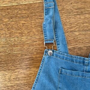 light blue denim coverall’s